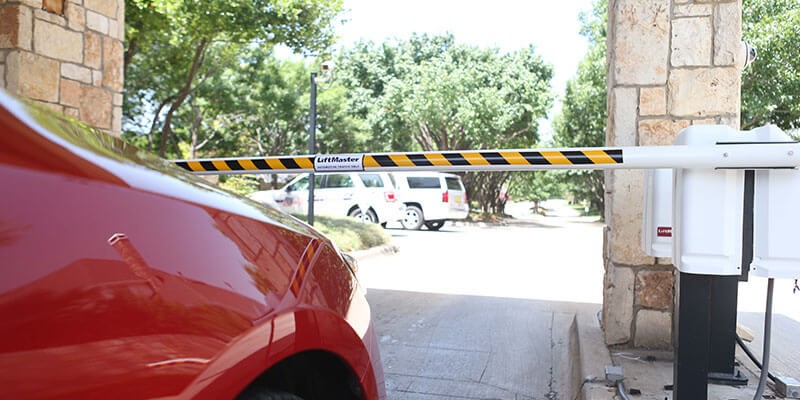 barrier arm used in front of vehicle at property entrance